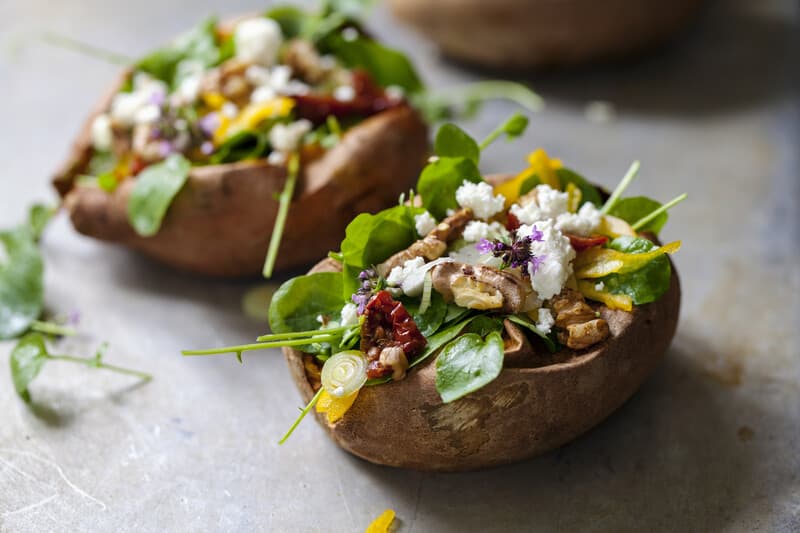 Baked sweet potato with salad