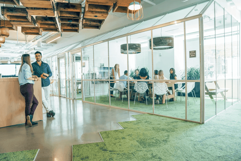 Group of people having a business meeting in modern office space